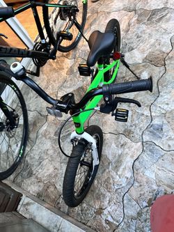 Kids bike with training wheels and helmet