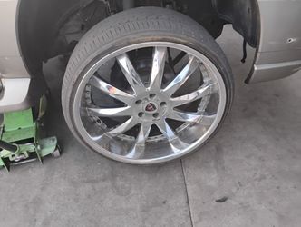 24 Inch Rims With Tires About 80% Thread On Them