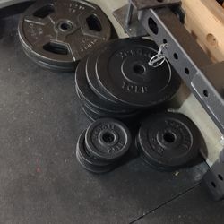 Iron Plates And Standard Barbell