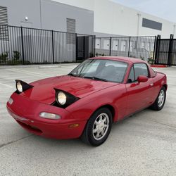 1990 Mazda Miata With A 5 Speed Manual Transmission!