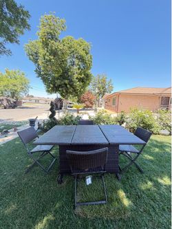 285$$ Beautiful patio set chairs store inside table like new
