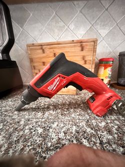 Milwaukee Brushless Screw Gun & M18 red Lithium 2.0 battery