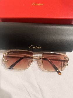 Cartier’s Tan lenses