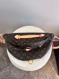 Medium size brown leather designer bag