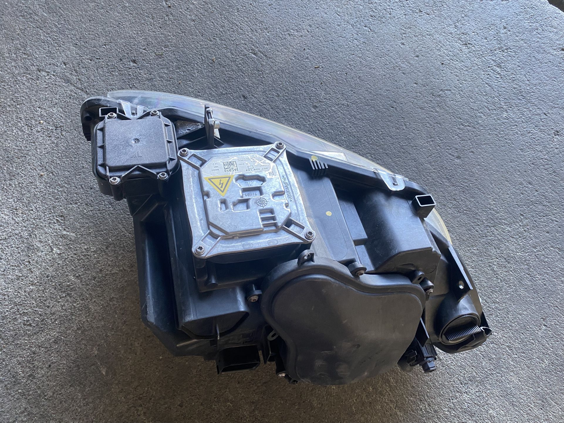 07-13 BMW 328I convertible left headlight