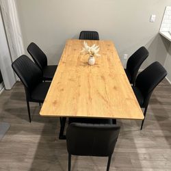 Extendable Brown Table with 6 Black Faux Leather Chairs 