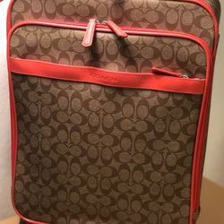 New carry on COACH rolling suitcase