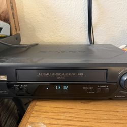 Sharp VC-A588 VCR and tape bundle (No remote. Excellent and functional condition)
