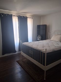 Queen size bed two bookshelves