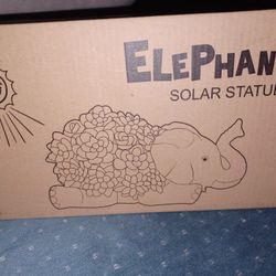 New elephant solar statue. Has a super cute design with flowers on its back. Lights up at night with solar power. Great for garden or patio decor.