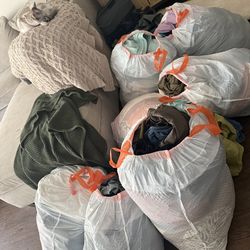 7 Bags of women’s clothing new /gently used