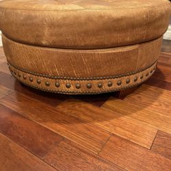 Leather beautiful ottoman  In great condition  40 by 17 hight