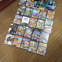 PS2 Games And Controllers As Well As Console 
