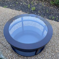 Round glass coffee table
