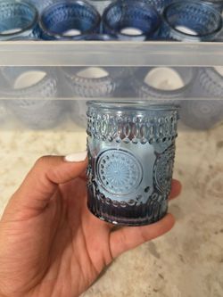 15 small blue bud vases