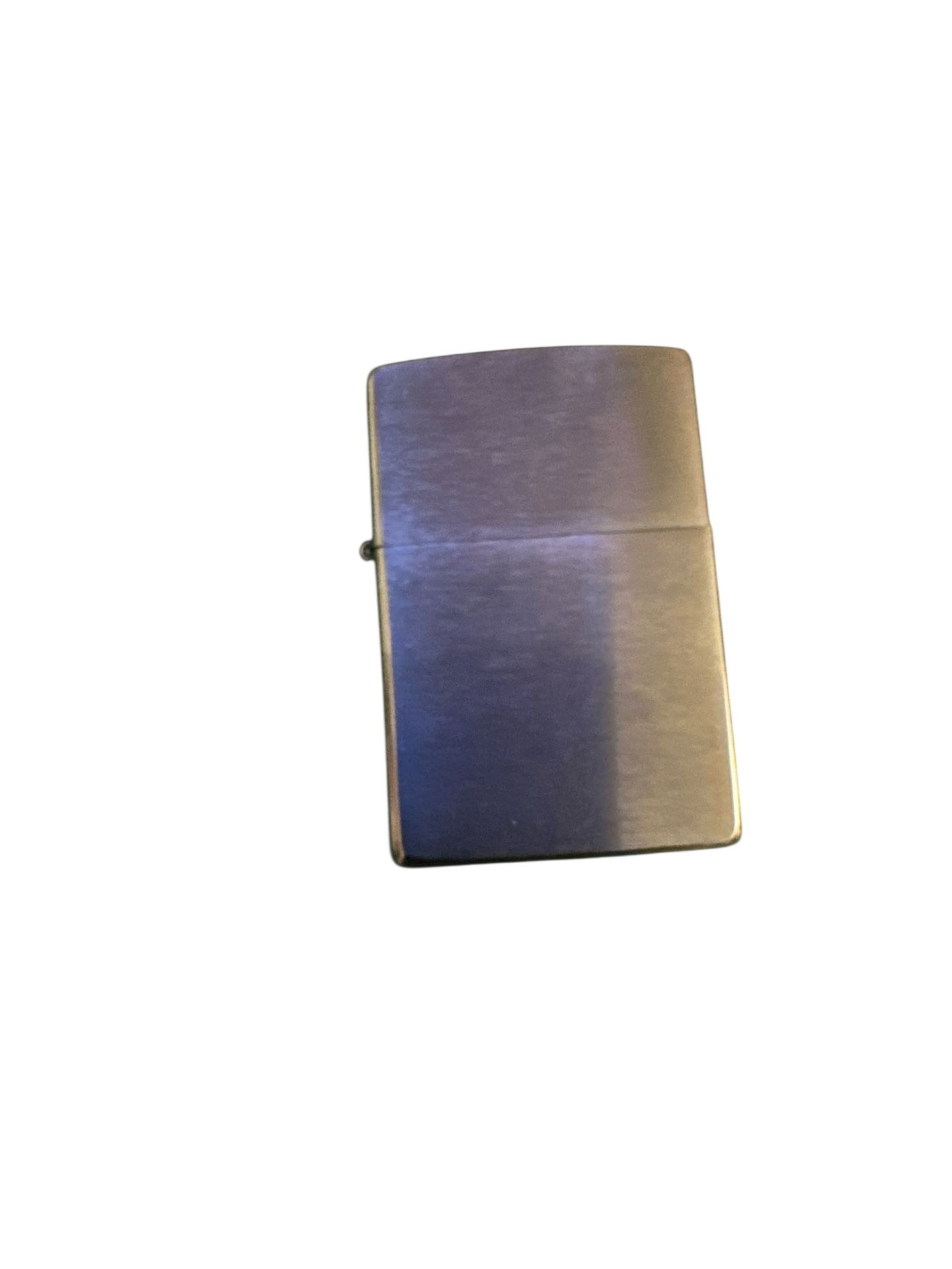 Zippo windproof lighter, an iconic American product. It is a reusable metal lighter, first introduced in 1933. Zippo lighters are known for their du