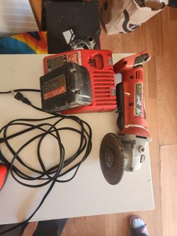 milwake grinder with battery and charger