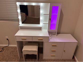 White vanity with brushed gold hardware