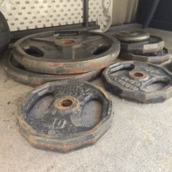 Weights  2-45lb 4-10lb Olympic Bar 