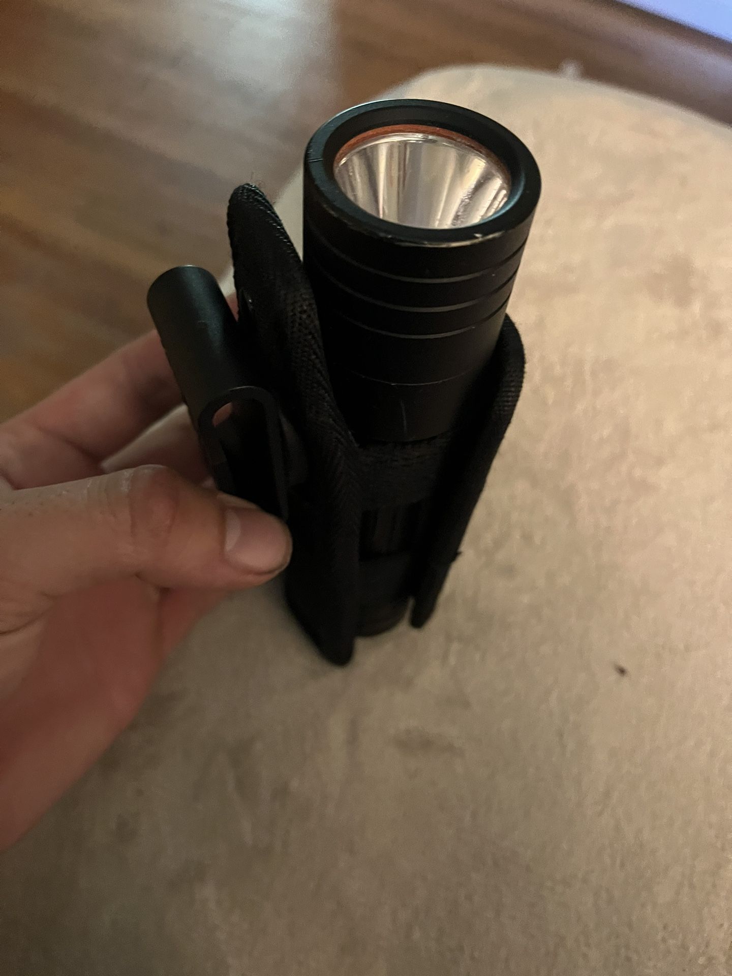 Flashlight And Holster.