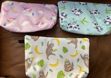 Three brand new Makeup bags