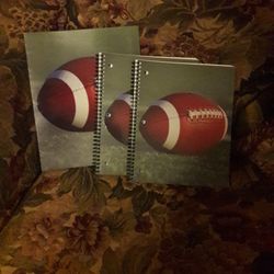 2- Football Spirals And 1 - Pocket Folder. All For $5