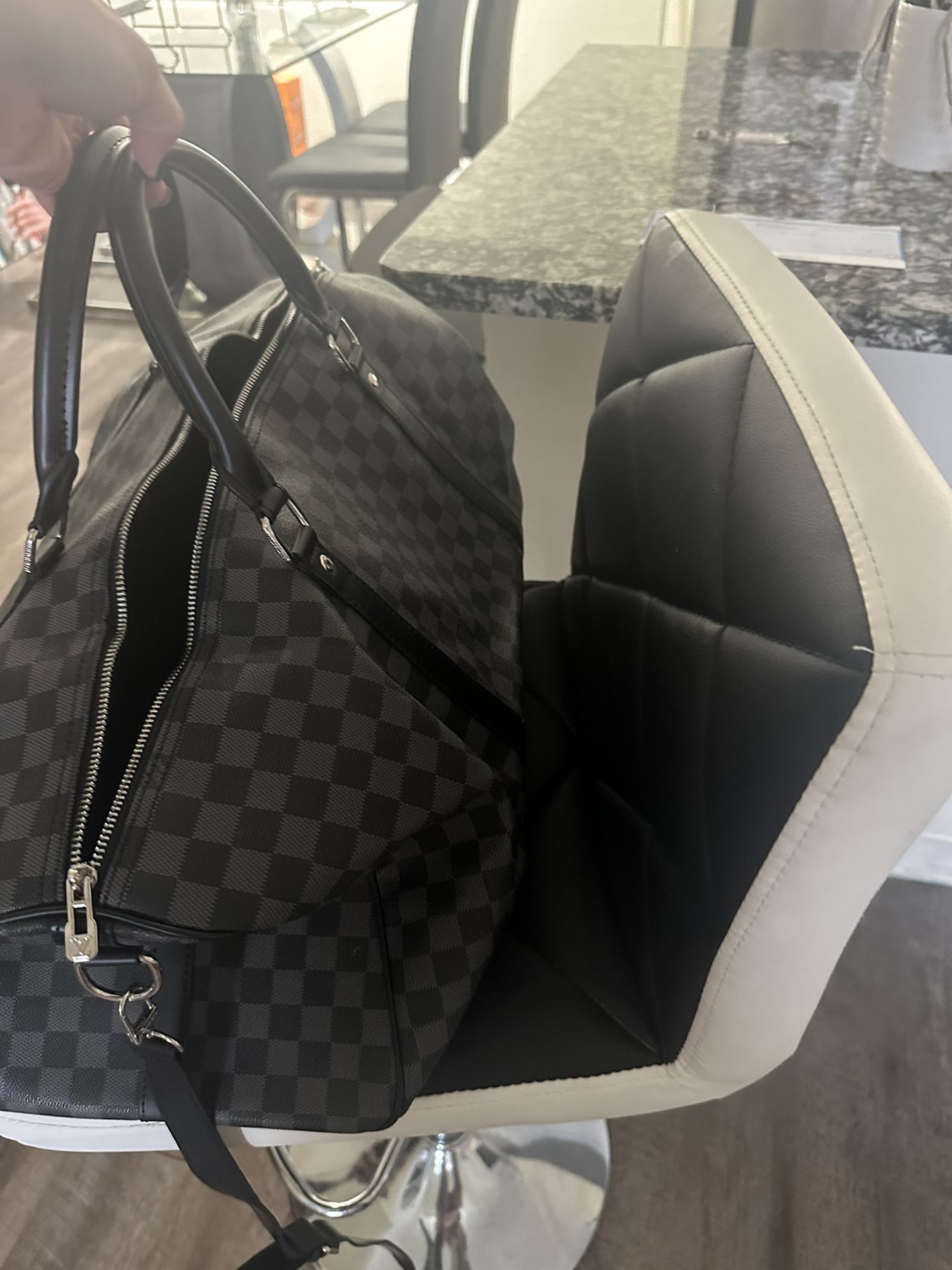 Louis Vuitton Small Duffle Bag for Sale in Ind Crk Vlg, FL - OfferUp