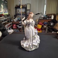 Stunning Porcelain Victorian Lady Music Box, Vintage Late 20th Century, An Elegant Figurine Of A Lady In A Flowing White Dress Adorned With Purple Flo