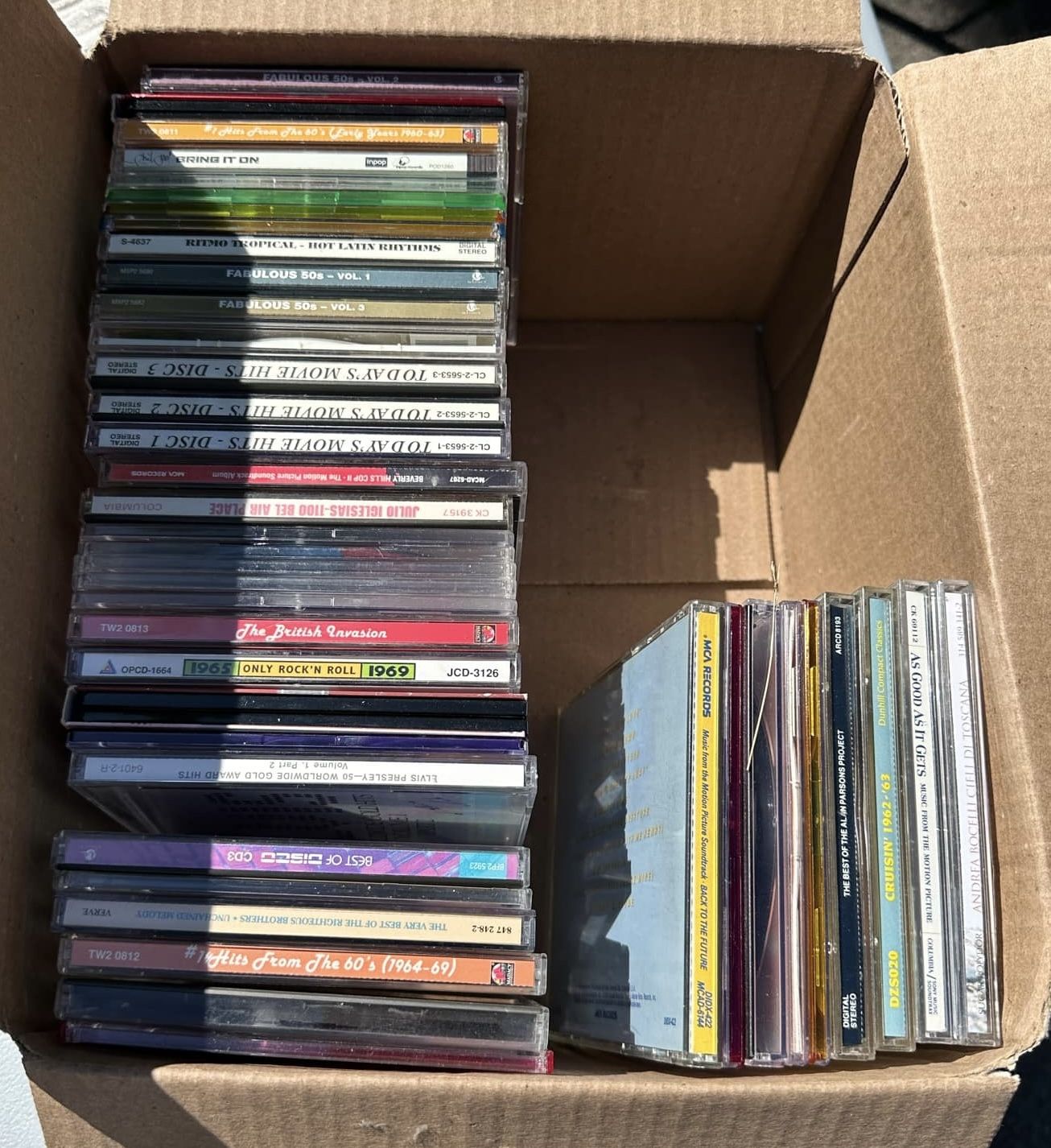 BOX OF ASSORTED MUSIC AND MOVIE SOUNDTRACK CDS FROM 1950s ONWARD