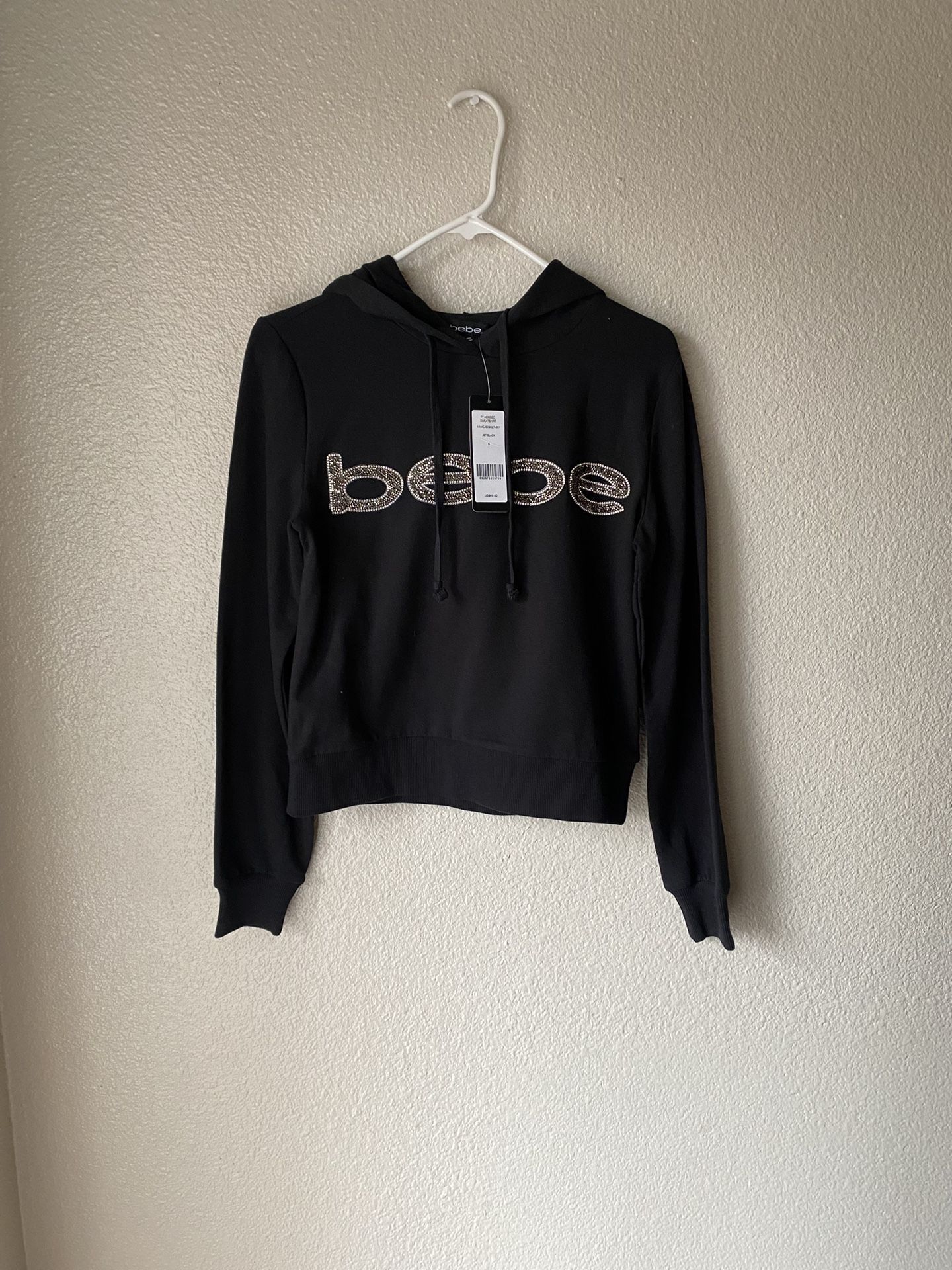 Brand new woman’s Bebe brand black hoodie up for sale