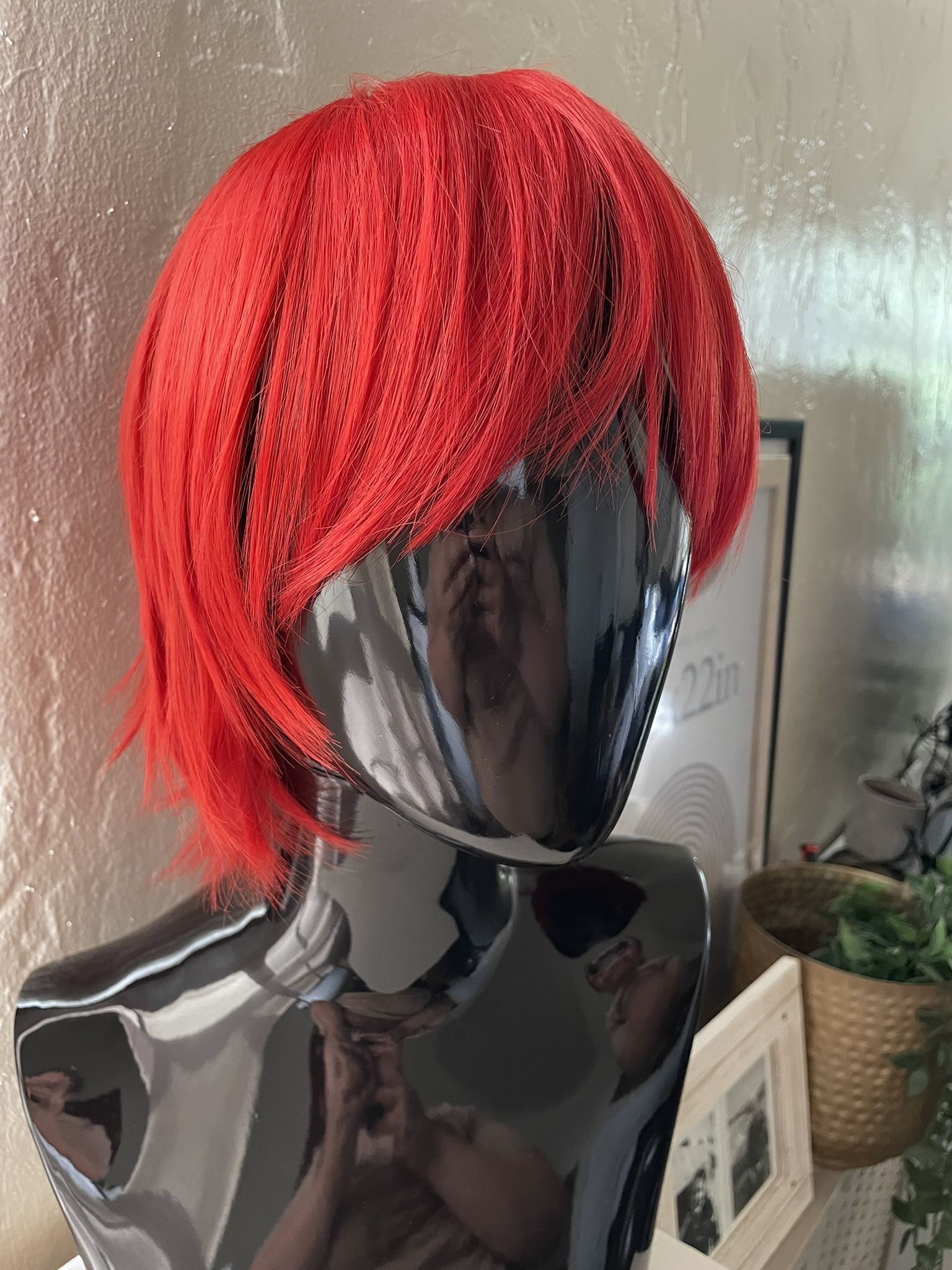 very good condition pre-owned short red synthetic wig 12 inches party anime halloween cosplay i used it as a wig for columbia from rocky horror, it