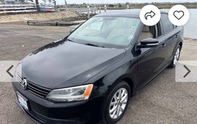 2010 black volxwagon Jetta