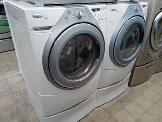 Whirlpool Duet front load washer and dryer set on pedestals - Free delivery