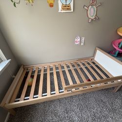 2 children's beds with mattresses