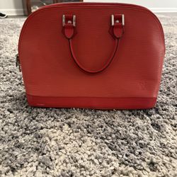 Louis Vuitton Alma Handbag Epi Leather 