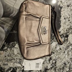New COACH wristlet. BRONZE Perfect for the holidays!