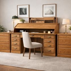 Solid Oak Roll-Top Executive Desk + 2 Matching File CabinetsBeautiful solid oak roll-top desk with two matching file cabinets — a complete executive o