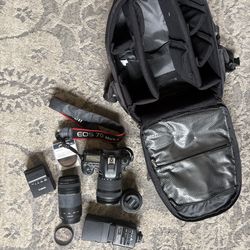 Canon 7D mark II with battery charger and more.