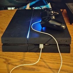 PS4 w/wireless Controller & 2 games