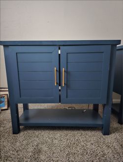 2 blue accent cabinets