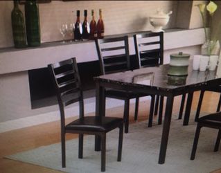 New in box 4 wood expreso chairs, one table marble like top.