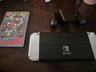 selling switch oled and iphone 11