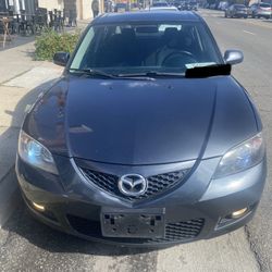 2009 Mazda Mazda3, Registered 24 Tags, New Kenwood DVD, BLUETOOTH, High End Head Lights And Super Clean Inside And Out!! Strong Eng, Trans, Saves Gas!