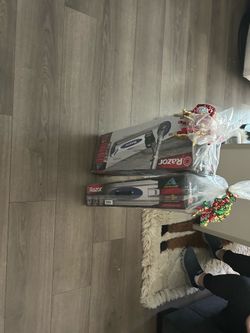 Brand new scooters for kids still in box.