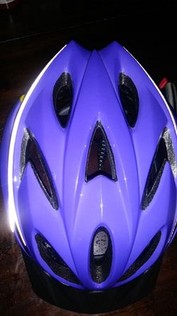 purple bicycle helmet with the back part in new yellow