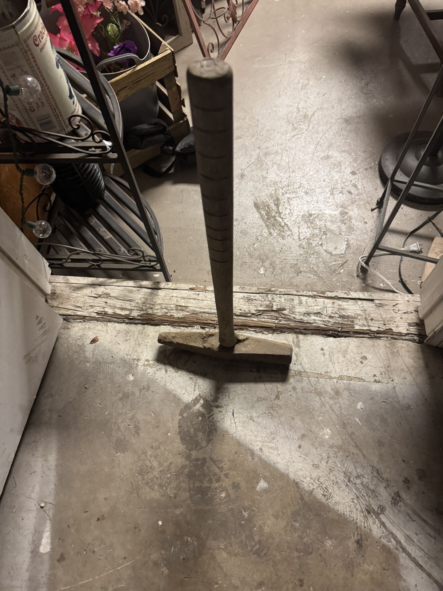 sledgehammer. It is a tool with a large, heavy head and a long handle, designed to be used with both hands. 29 H