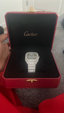 Iced out skeleton Cartier watch