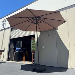 9 ft. Market Patio Umbrella with Base and Push Button Tilt in Tan Good Condition
