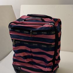 4 wheels 360 turns NEW  Lesportsac Travel Carry On