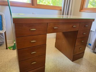 Vintage wood desk with 7 drawers
Glass top kept the top gorgeous
46"w x 22"d x 29.5"h